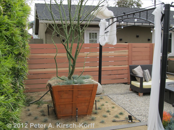 Redwood Patio Garden Enclosure Separating Master Bedroom from patio in Costa Mesa